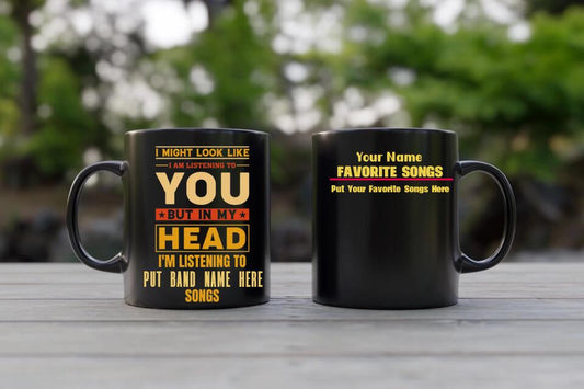 I Might Look Like I Am Listening To You But In My Head I'm Listening To Songs Black Mug 11oz